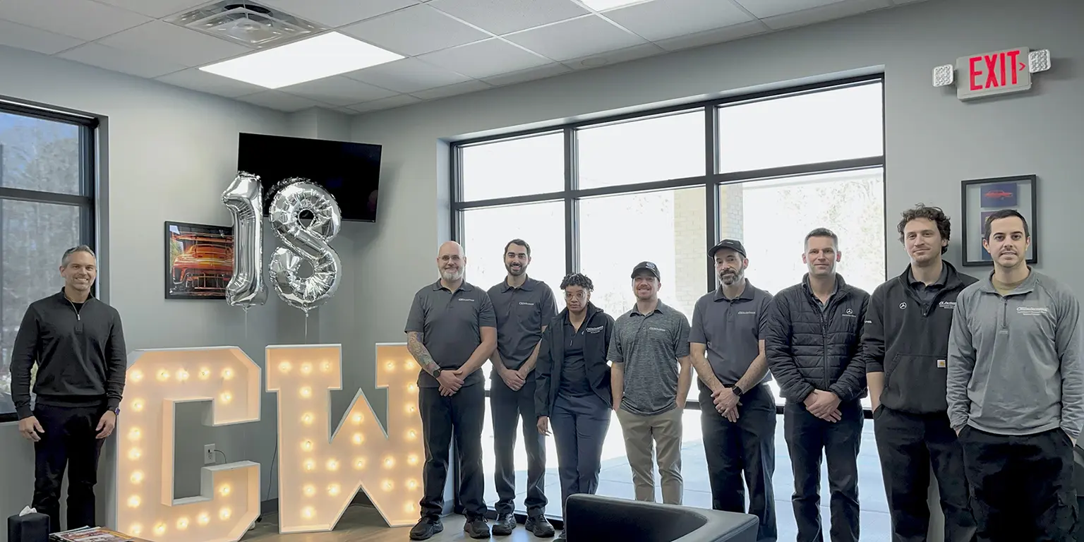 Team celebrating 18th anniversary event at CW Performance in Apex, NC