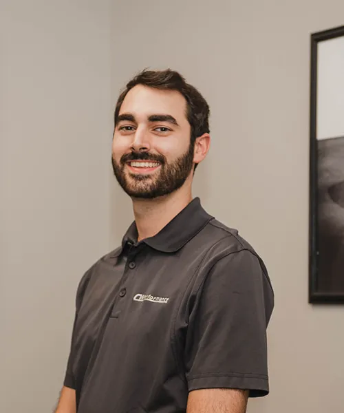 Smiling man in a polo shirt