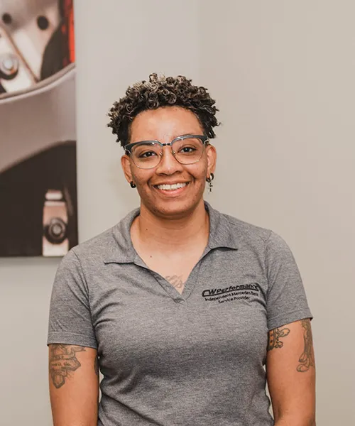 Smiling woman with short curly hair