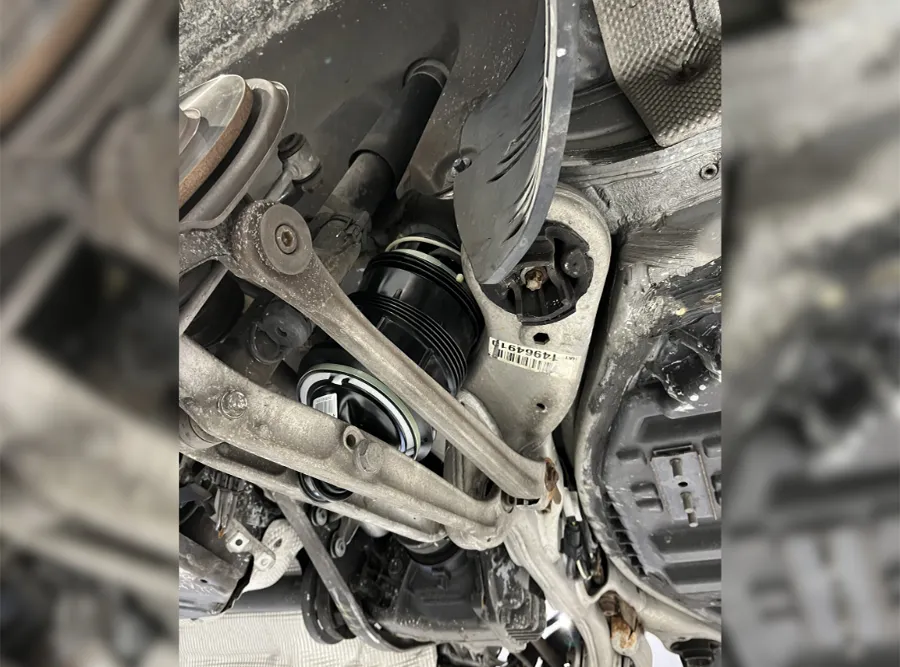 Mercedes-Benz suspension repair in Apex, NC by CW Performance. Image of a vehicle’s suspension system with control arms and air suspension components, highlighting improved ride quality, handling, and overall vehicle performance.